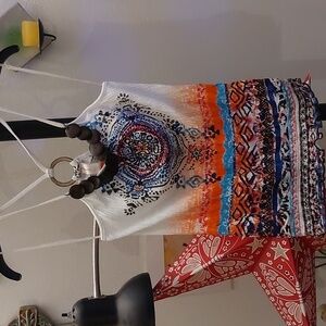 Spaghetti strap top with beautiful bright pattern and wooden details